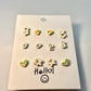 Set de aretes de ceramica color blanco